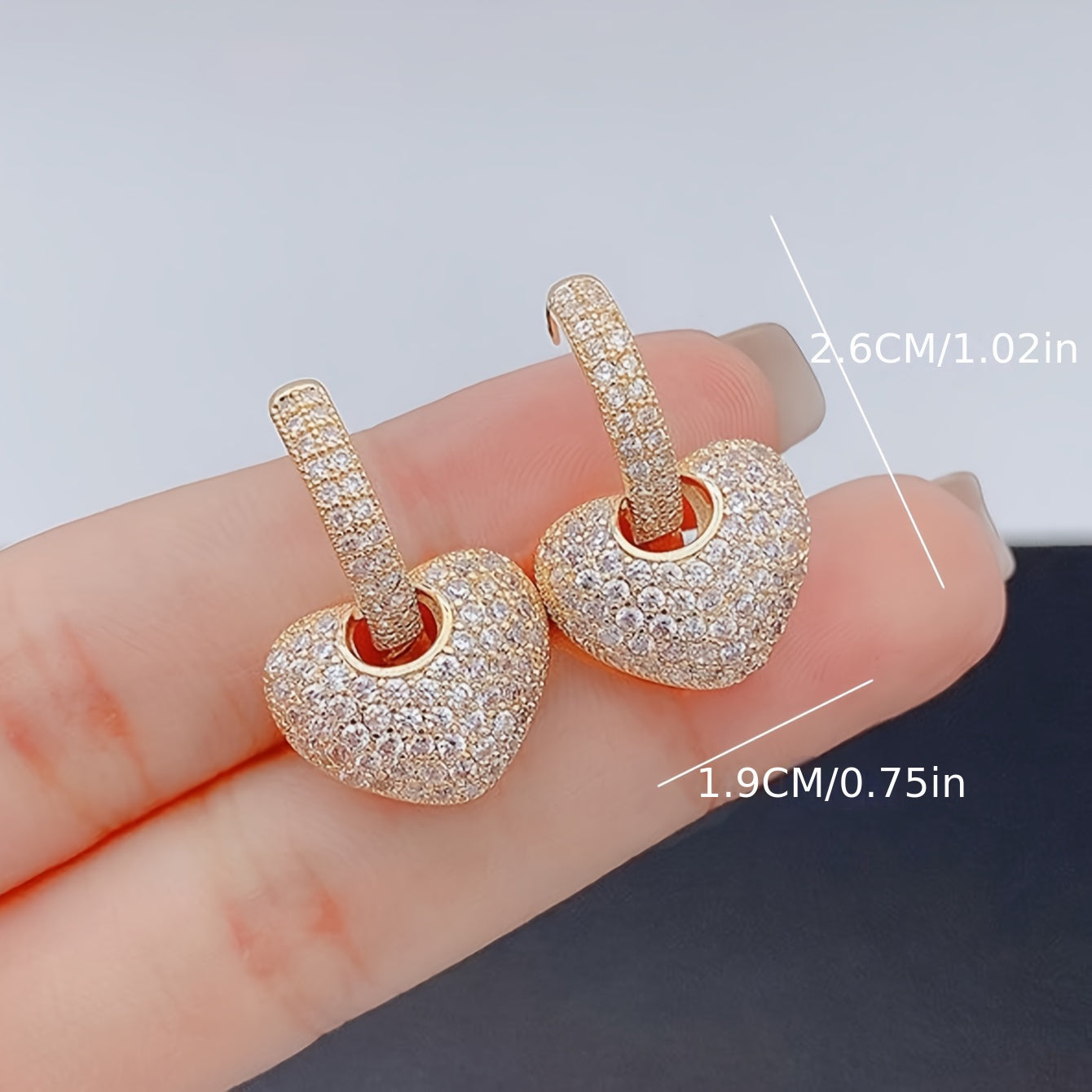 Elegant Gold Earrings with zirconia adding sparkle to your fashion